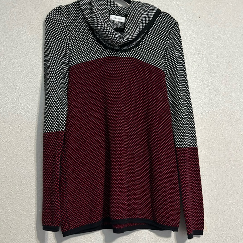 58. What a lovely Calvin Klein sweater made of 100% cotton.